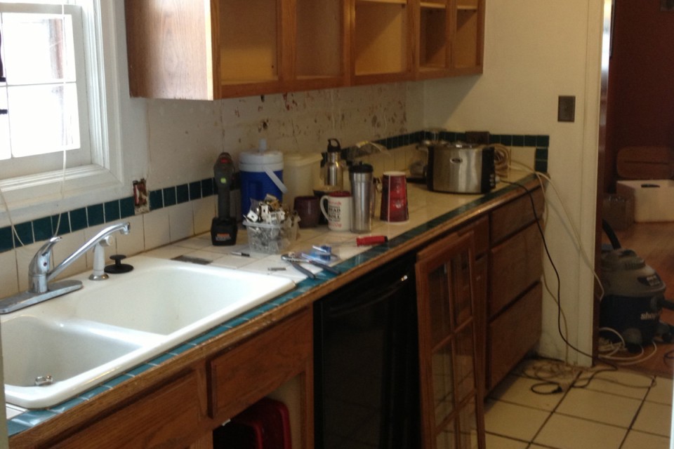 The kitchen countertops before Glasser's project.
