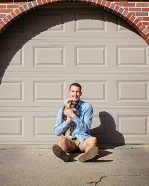 Dylan Folda and dog, at home