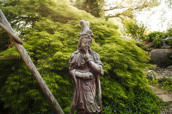 statue in Bing Chen’s home garden